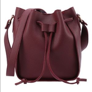 Bucket bag with adjustable strap NWT make an offer